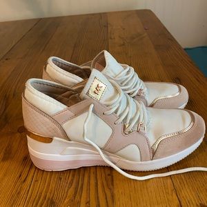 Michael Kors tennis shoes leather and fabric with signature detail in rose gold.